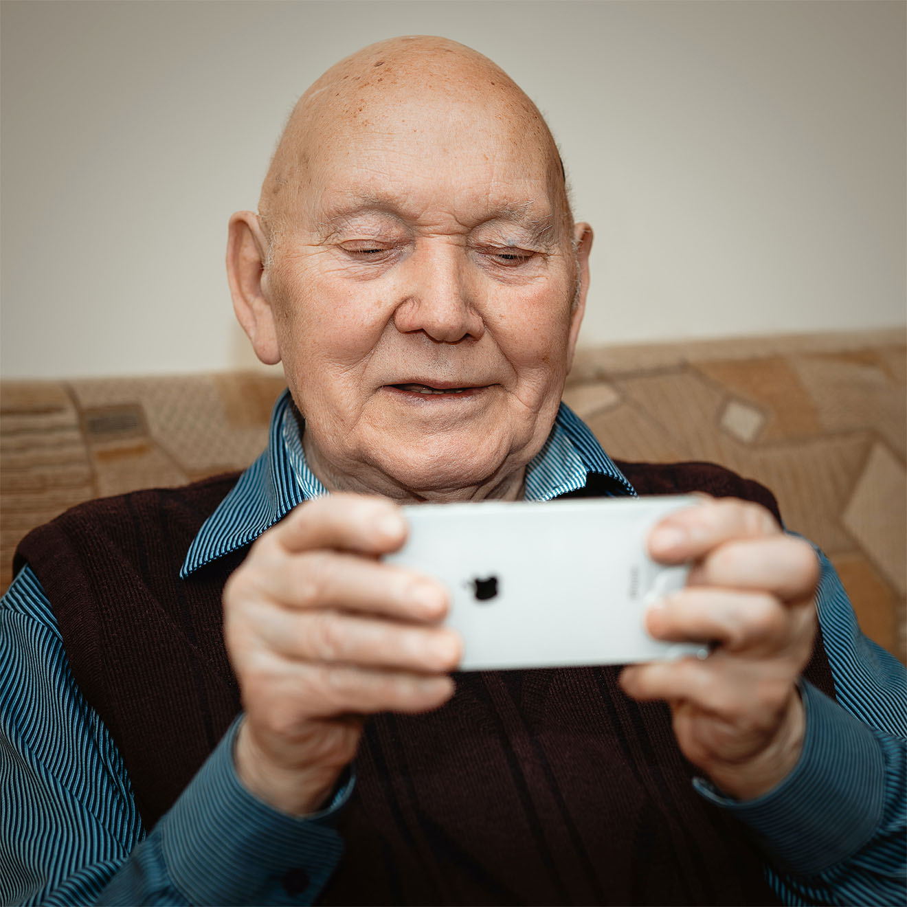 A resident using a mobile phone