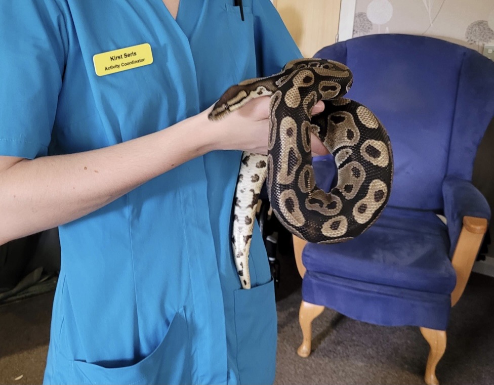 Staff Member Holding Snake