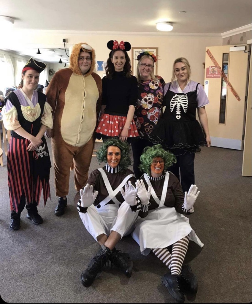 Staff Dressed Up in Halloween Costumes