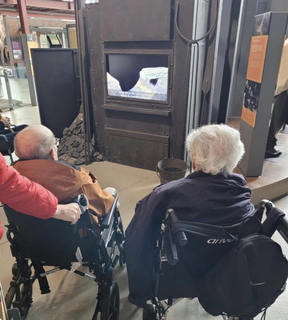 Residents Watching a Video at Summerlee Museum