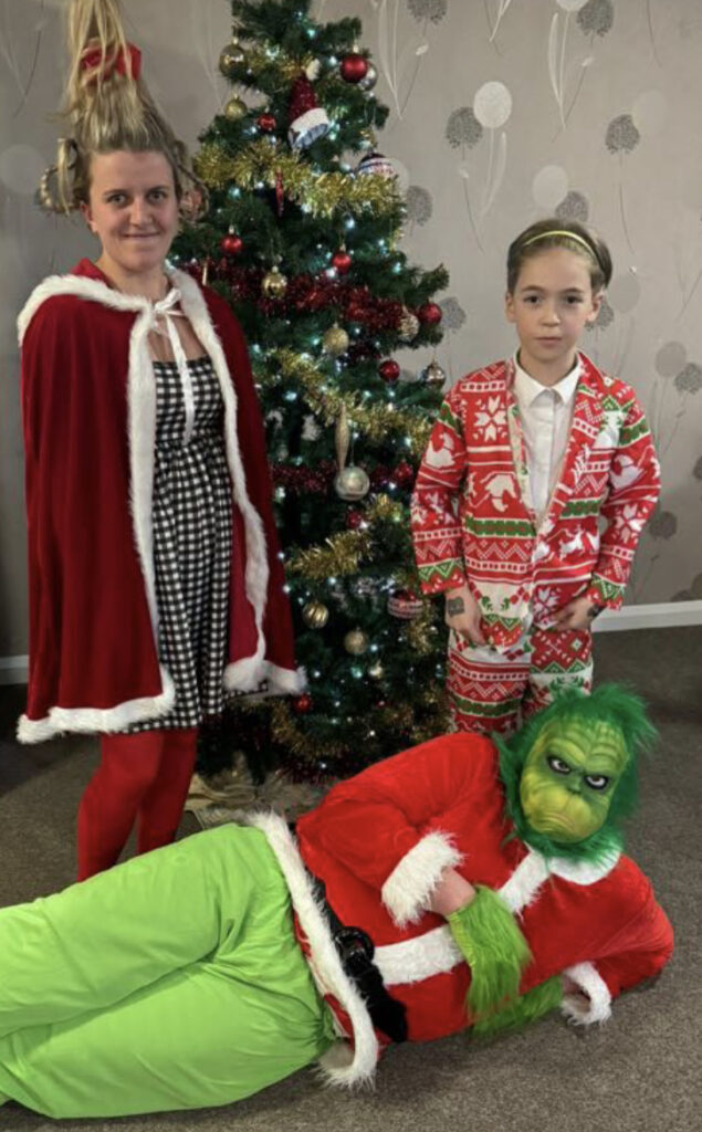 People Dressed up as the Grinch and Whoville Characters