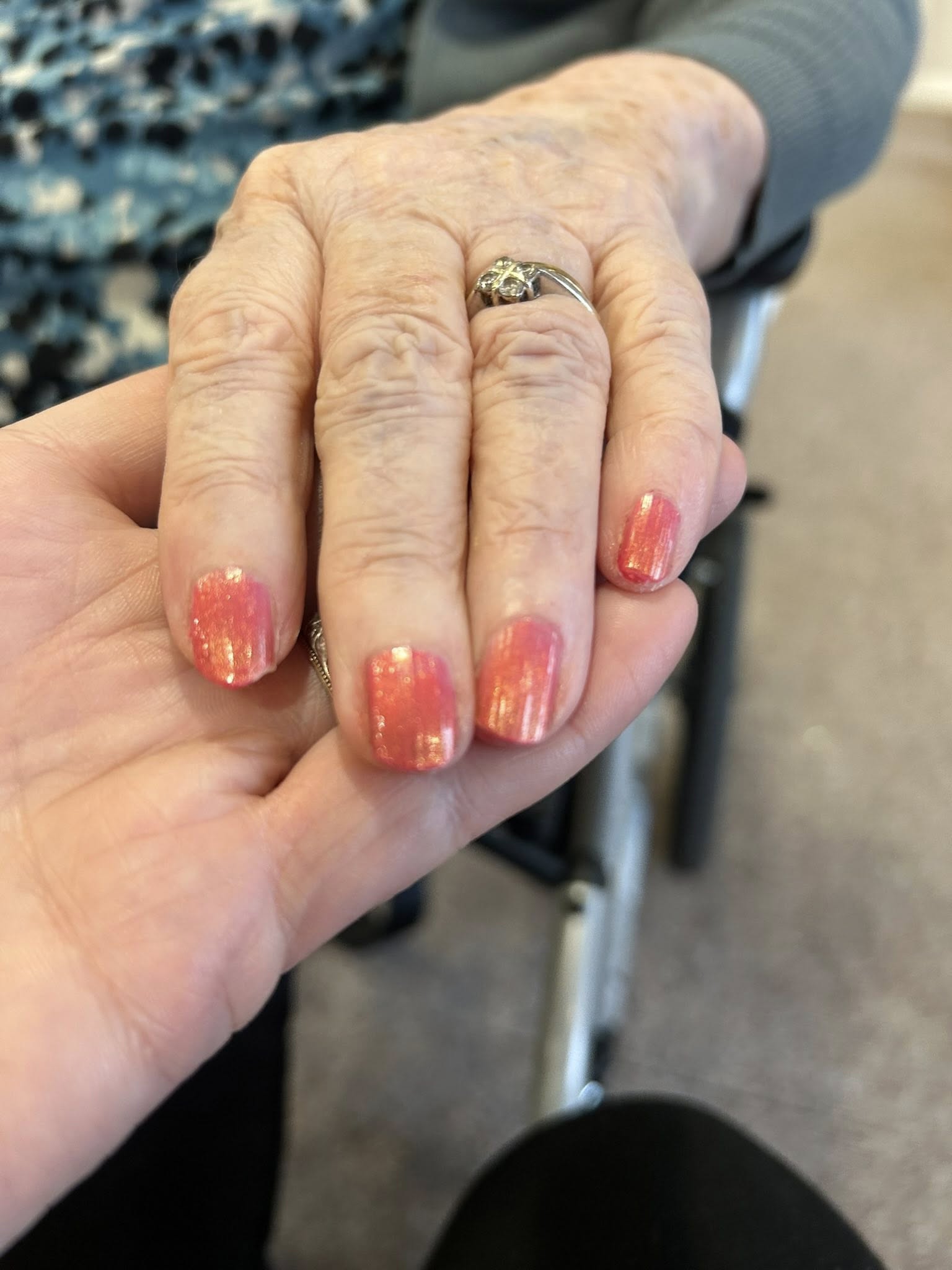 resident getting her nails done
